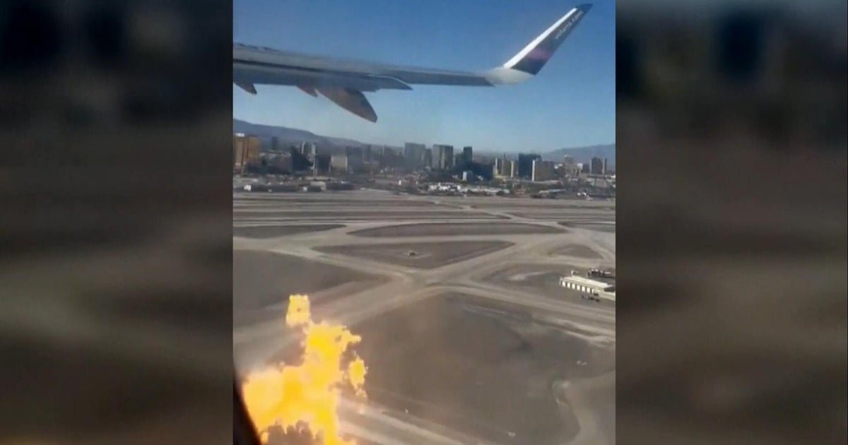 cbsn fusion video shows flames shooting plane engine minutes takeoff thumbnail