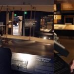 mo rocca and lonnie bunch with the wright brothers plane