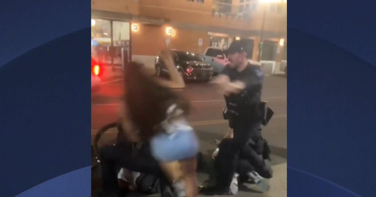 cbsn fusion video shows cheerleader shoved ground police thumbnail